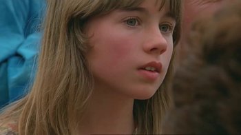 Movie still from “Alligator” (1980), directed by Lewis Teague – A young girl's face; Close Up shot, Low angle