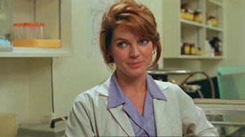 Movie still from “Alligator” (1980), directed by Lewis Teague – A person wearing a lab coat; Close Up shot, Low angle