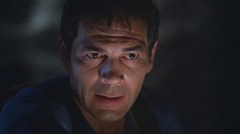 Movie still from “Alligator” (1980), directed by Lewis Teague – A person looking at the camera; Close Up shot, Low angle