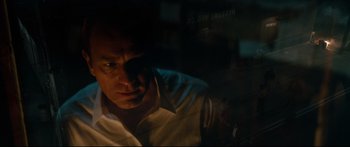 Movie still from “American Pastoral” (2016), directed by Ewan McGregor – A person looking out of a window; Close Up shot, Low angle