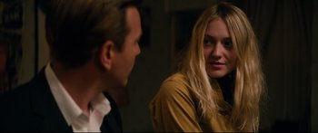 Movie still from “American Pastoral” (2016), directed by Ewan McGregor – A man and a woman sitting next to each other in a room; Close Up shot, Over the shoulder angle