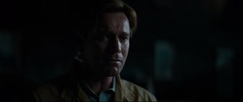 Movie still from “American Pastoral” (2016), directed by Ewan McGregor – A person wearing a jacket; Close Up shot, Over the shoulder angle