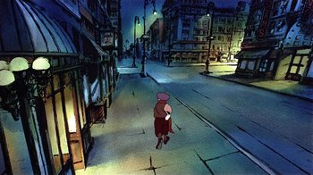 Movie still from “American Pop” (1981), directed by Ralph Bakshi – A person walking down a street at night; Wide shot, High angle