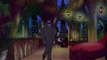 Movie still from “American Pop” (1981), directed by Ralph Bakshi – A man in a suit and hat walking through a room; Wide shot, High angle