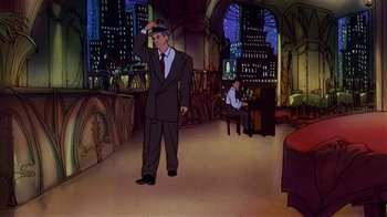 Movie still from “American Pop” (1981), directed by Ralph Bakshi – A man in a suit and tie standing in front of another man in a suit and tie; Wide shot, High angle