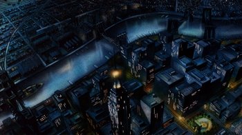 Movie still from “American Pop” (1981), directed by Ralph Bakshi – An aerial view of a city at night with lights; Extreme Wide shot, High angle