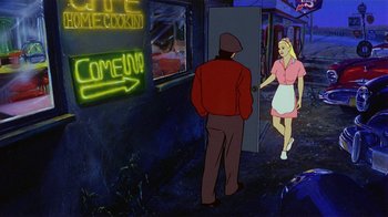 Movie still from “American Pop” (1981), directed by Ralph Bakshi – An animated scene of a man and a woman walking down the street; Wide shot, High angle