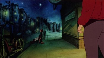 Movie still from “American Pop” (1981), directed by Ralph Bakshi – A cartoon of a man sitting on the ground in front of a building; Wide shot, Low angle