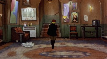 Movie still from “American Pop” (1981), directed by Ralph Bakshi – A man walking down the stairs in a room; Wide shot, Low angle