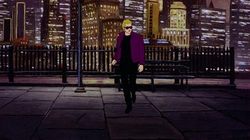 Movie still from “American Pop” (1981), directed by Ralph Bakshi – A man in a purple jacket walking on a sidewalk; Wide shot, Low angle