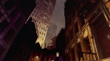 Movie still from “American Pop” (1981), directed by Ralph Bakshi – A man in a purple jacket standing in the street; Wide shot, Low angle