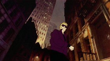 Movie still from “American Pop” (1981), directed by Ralph Bakshi – A man in a purple jacket standing in the middle of a street; Medium shot, Low angle