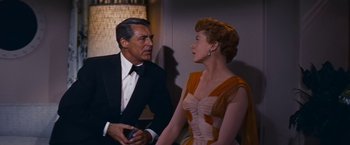 Movie still from “An Affair to Remember” (1957), directed by Leo McCarey – A man and a woman talking to each other; Medium shot, Over the shoulder angle