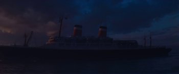 Movie still from “An Affair to Remember” (1957), directed by Leo McCarey – A large cruise ship in the dark at night; Extreme Wide shot, Low angle