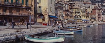 Movie still from “An Affair to Remember” (1957), directed by Leo McCarey – Several small boats are docked in the water; Extreme Wide shot, High angle