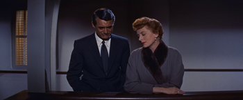 Movie still from “An Affair to Remember” (1957), directed by Leo McCarey – A man and a woman standing next to each other; Medium shot, Low angle