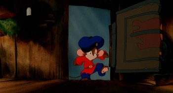 Movie still from “An American Tail: Fievel Goes West” (1991), directed by Simon Wells – A cartoon of a mouse wearing a blue hat; Medium shot, High angle