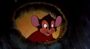 Movie still from “An American Tail: Fievel Goes West” (1991), directed by Simon Wells – A cartoon of a mouse looking out of a hole; Close Up shot, High angle