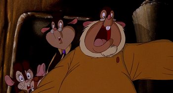 Movie still from “An American Tail: Fievel Goes West” (1991), directed by Simon Wells – A couple of cartoon characters sitting next to each other; Close Up shot, Low angle