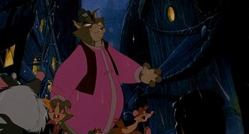 Movie still from “An American Tail: Fievel Goes West” (1991), directed by Simon Wells – A picture of a cat and a mouse in a city; Medium shot, Low angle