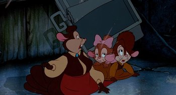 Movie still from “An American Tail: Fievel Goes West” (1991), directed by Simon Wells – A group of cartoon characters sitting next to each other on the ground; Medium shot, High angle