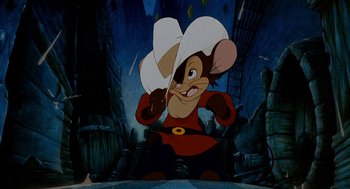 Movie still from “An American Tail: Fievel Goes West” (1991), directed by Simon Wells – A mouse wearing a cowboy hat in a painting; Medium shot, High angle
