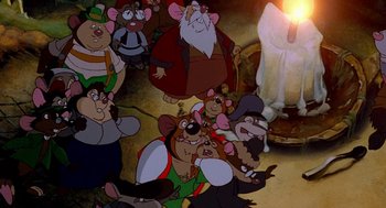 Movie still from “An American Tail: Fievel Goes West” (1991), directed by Simon Wells – Many cartoon characters on the floor; Wide shot, High angle