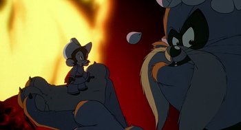 Movie still from “An American Tail: Fievel Goes West” (1991), directed by Simon Wells – A picture of some kind of character in a cartoon; Medium shot, Over the shoulder angle