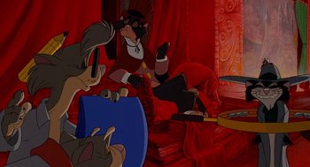 Movie still from “An American Tail: Fievel Goes West” (1991), directed by Simon Wells – A group of people sitting on top of a bed; Medium shot, High angle