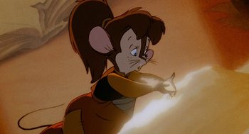 Movie still from “An American Tail: Fievel Goes West” (1991), directed by Simon Wells – A mouse that is holding something in its mouth; Close Up shot, High angle
