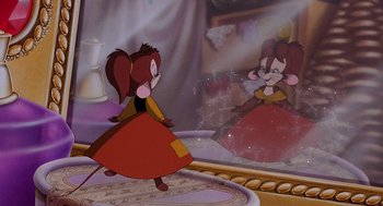 Movie still from “An American Tail: Fievel Goes West” (1991), directed by Simon Wells – A picture of a scene in a cartoon with a mouse; Medium shot, Over the shoulder angle