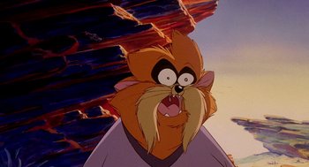 Movie still from “An American Tail: Fievel Goes West” (1991), directed by Simon Wells – A cartoon character with a mountain in the background; Close Up shot, High angle