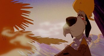 Movie still from “An American Tail: Fievel Goes West” (1991), directed by Simon Wells – A cartoon character with a bird flying in the background; Close Up shot, Low angle