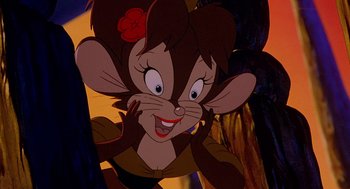 Movie still from “An American Tail: Fievel Goes West” (1991), directed by Simon Wells – A cartoon picture of a mouse with a flower in her hair; Close Up shot, High angle