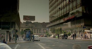 Movie still from “And Your Mother Too” (2001), directed by Alfonso Cuarón – A city street filled with lots of traffic; Extreme Wide shot, High angle