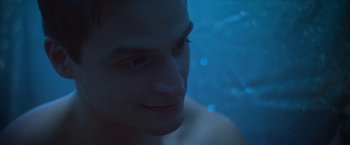 Movie still from “Angel of Anywhere” (2018), directed by James Kicklighter – A man's face in the water; Close Up shot, High angle