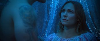 Movie still from “Angel of Anywhere” (2018), directed by James Kicklighter – A woman looking at herself in the mirror; Close Up shot, Over the shoulder angle