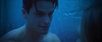 Movie still from “Angel of Anywhere” (2018), directed by James Kicklighter – A man with wet hair and no shirt in the water; Close Up shot, Low angle