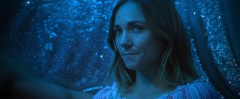 Movie still from “Angel of Anywhere” (2018), directed by James Kicklighter – A woman's face in front of a window; Close Up shot, Over the shoulder angle