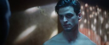 Movie still from “Angel of Anywhere” (2018), directed by James Kicklighter – A person wearing a white shirt; Close Up shot, Low angle