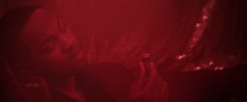 Movie still from “Angel of Anywhere” (2018), directed by James Kicklighter – A person holding a cell phone in their hand; Close Up shot, Overhead angle