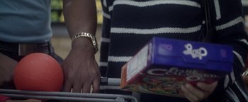 Movie still from “Angel of Anywhere” (2018), directed by James Kicklighter – A woman's arm with a bracelet on her wrist; Extreme Close Up shot, Low angle