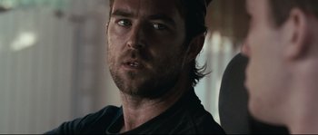 Movie still from “Animal Kingdom” (2010), directed by David Michôd – A person wearing a hat; Close Up shot, Over the shoulder angle