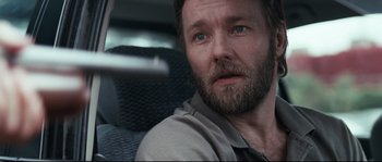 Movie still from “Animal Kingdom” (2010), directed by David Michôd – A person sitting in a car; Close Up shot, Over the shoulder angle