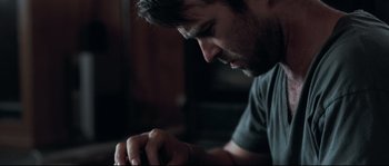 Movie still from “Animal Kingdom” (2010), directed by David Michôd – A man looking down at his hands; Close Up shot, Low angle