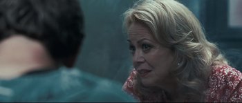Movie still from “Animal Kingdom” (2010), directed by David Michôd – An older woman sitting in front of a mirror; Close Up shot, Over the shoulder angle