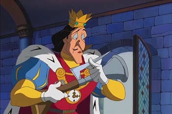 Movie still from “Animaniacs: Wakko's Wish” (1999), directed by Kirk Tingblad – A cartoon of a man in a crown holding a hammer; Medium shot, Low angle