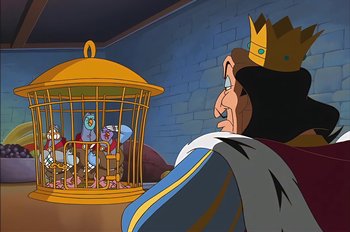 Movie still from “Animaniacs: Wakko's Wish” (1999), directed by Kirk Tingblad – A cartoon of a king looking at a cage of birds; Wide shot, Over the shoulder angle