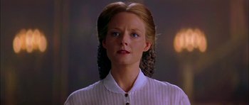 A person wearing a white shirt