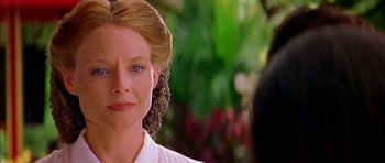Movie still from “Anna and the King” (1999), directed by Andy Tennant – A person wearing a white shirt; Close Up shot, Over the shoulder angle